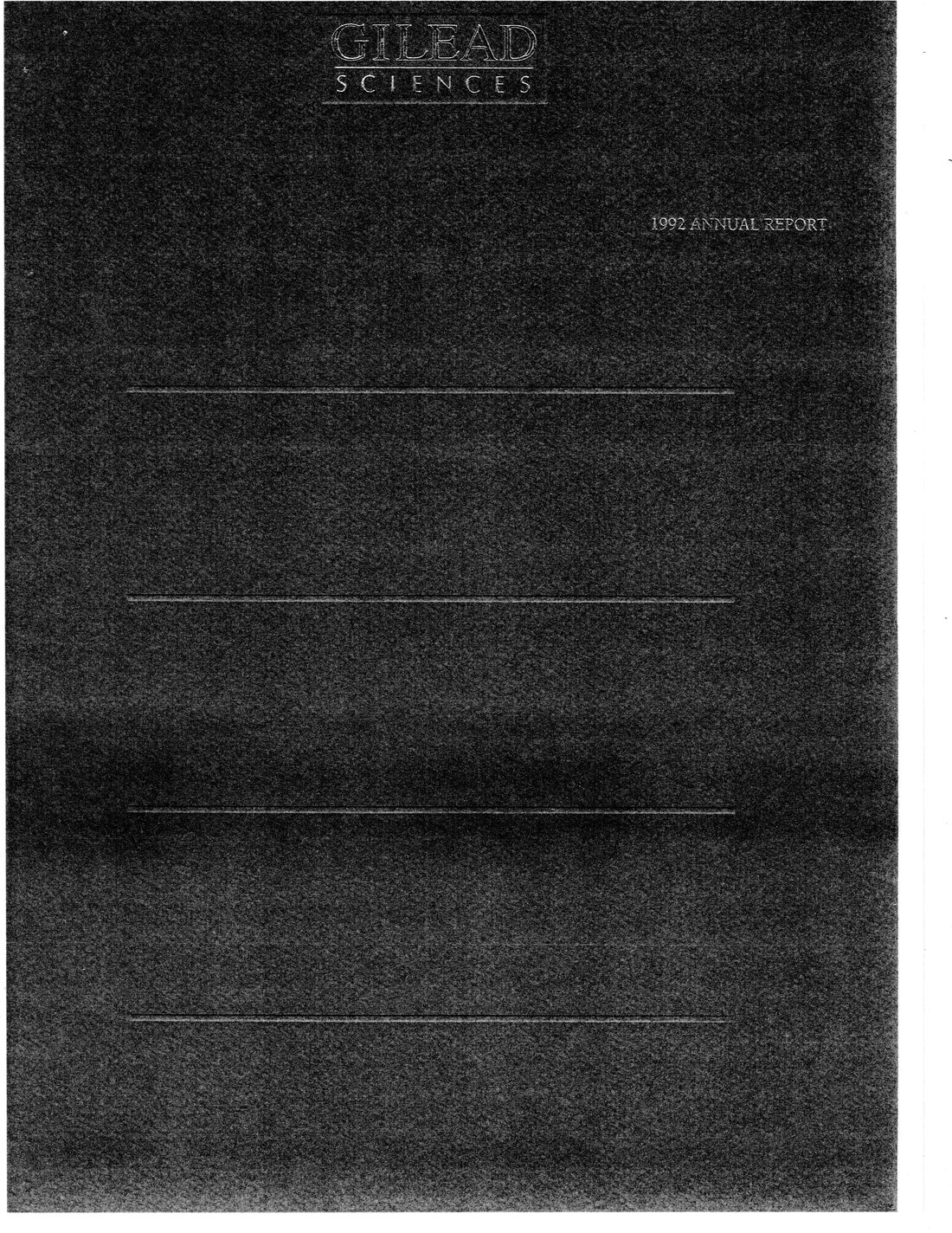 Front cover of the Gilead Sciences 1992 Annual Report. Dark textured cover with the embossed Gilead Sciences logo at top and the words '1992 Annual Report'.